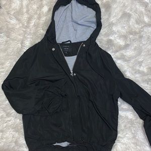Women’s black wind breaker
